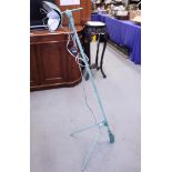 A Hanovia turquoise painted "Bikini lamp", 52" high (for ornamental use only)