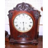 An early 20th century mahogany cased bracket clock with white painted dial and Roman numerals, 19"
