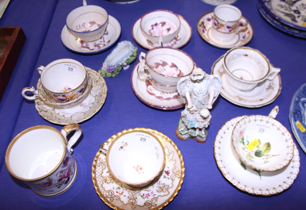 A Chamberlain's Worcester floral and gilt decorated cabinet cup and saucer, two similar cups and