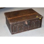 A late 17th century oak lace box with carved panel front and sides, later hinges and japanned liner,