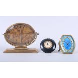 An Art Deco brass cased mantel clock with faux tortoiseshell dial, a brass cased travel alarm