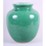 A Chinese bulbous vase with green crackled glaze, 10" high