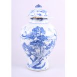A Chinese blue and white oviform vase and cover, decorated animals in landscape, 17" high (damages)
