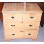 A waxed pine chest of two short and two long drawers, on bracket feet, 32" wide