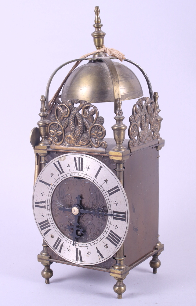 A well reproduced lantern clock, 12" high