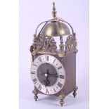 A well reproduced lantern clock, 12" high