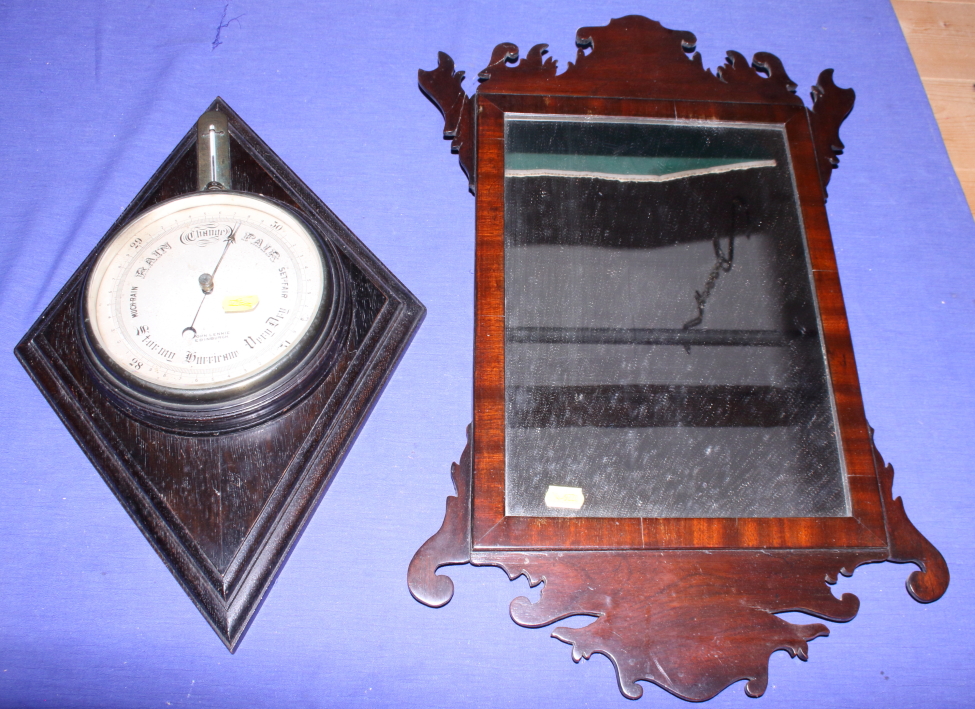 An early 20th century mahogany framed mirror and a John Lennie barometer