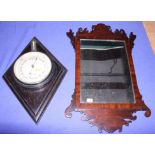 An early 20th century mahogany framed mirror and a John Lennie barometer
