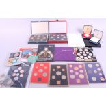 A 1977 Jubilee silver proof crown, a 1981 Royal Wedding silver proof crown, thirteen sets of proof