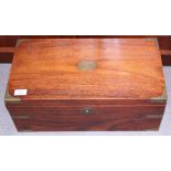A 19th century Dabergia and brass bound writing box with fitted interior, three secret drawers and
