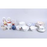 A Continental porcelain Toby jug, a companion Martha Gunn jug, a Minton breakfast cup and saucer and