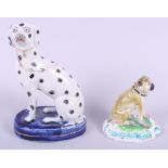 A 19th century Staffordshire dalmatian, 5" high, and an 18th century Derby model of a pug (