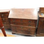 A Georgian mahogany fall front bureau, the interior fitted two drawers and pigeonholes over four