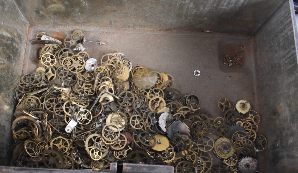 A quantity of clock coil springs, balance wheels and other clock/watch cogs (for restoration - Image 3 of 3