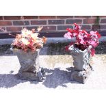 A pair of metal planters, decorated in foliage, 9" wide x 12" high