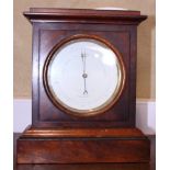 A Negretti and Zambra aneroid barometer, in figured mahogany and ebony line inlaid case, 9 1/4"