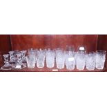 A pair of cut glass salt cellars, four glass candleholders, two brandy balloons and other glasses,