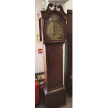 A late Georgian oak long case clock with eight-day striking movement and brass arch top dial by