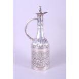 An embossed Passover wine decanter and stopper, stamped sterling, 13" high