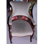 A late Victorian mahogany open armchair with spindle back, on square taper supports