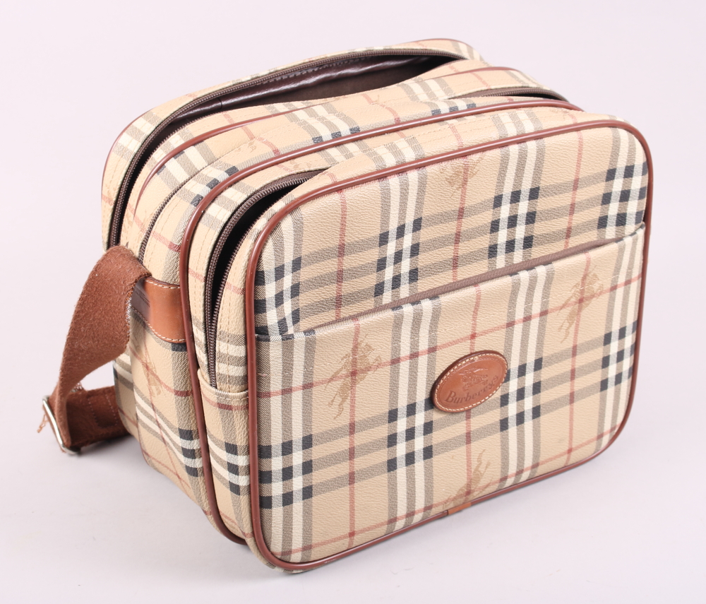 A Burberry design three-compartment tartan bag