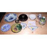 A 19th century Chinese export blue and white dish, a hardwood stand and other Oriental ceramics,