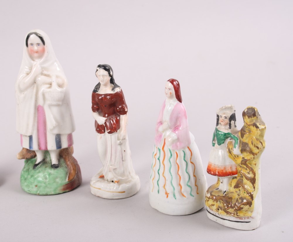 A 19th century Staffordshire figure, Faith, 4 1/2" high, and nine other similar Staffordshire - Image 4 of 7