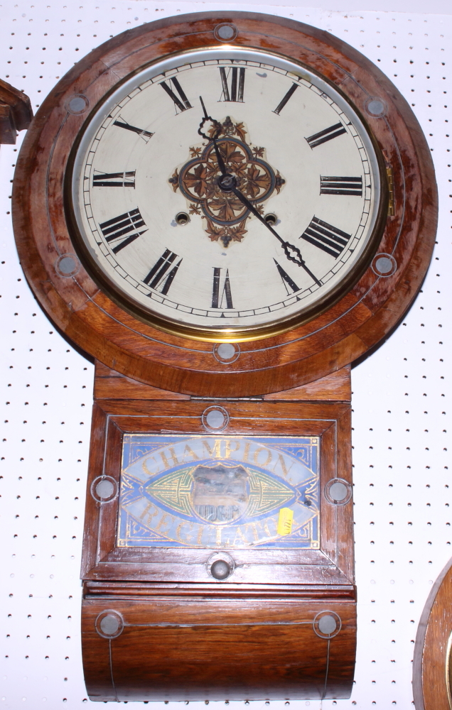A mahogany cased wall clock with Roman numerals, painted dial and lower painted glass panel "