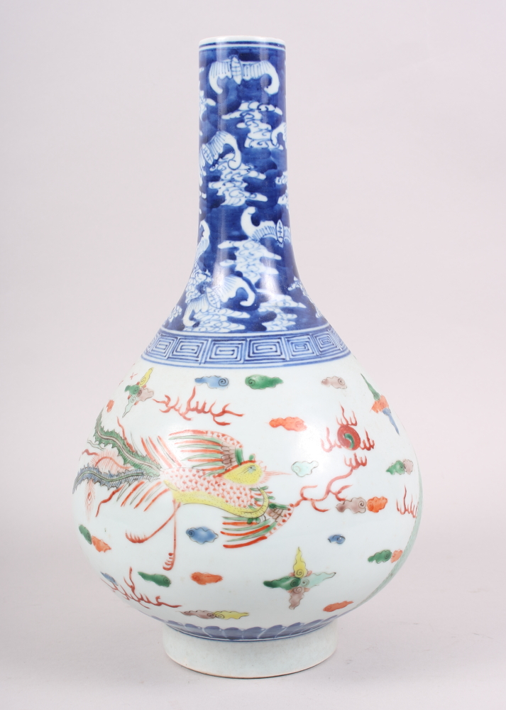 A Chinese porcelain polychrome sprinkler vase, decorated dragons, 12" high