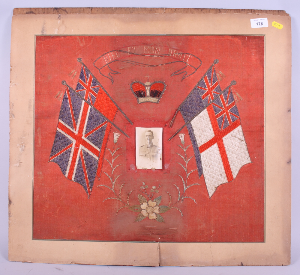 A WWI period embroidery, "Dieu et Mon Droit", decorated with regimental flags, unframed