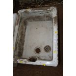 A Belfast sink, 18" wide, and another Belfast sink, prepared for stone covering, 24" wide