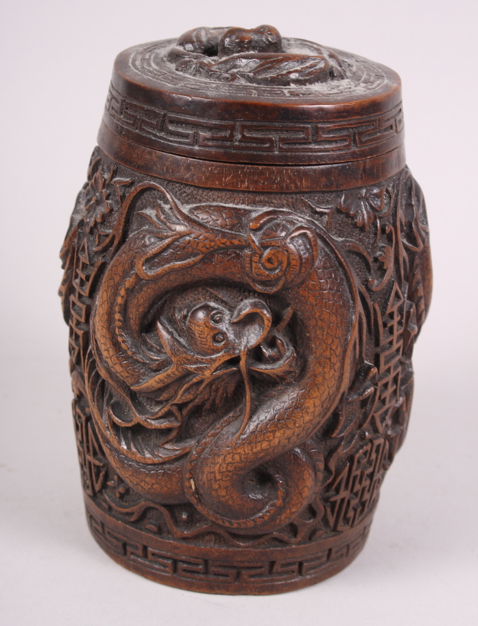 A Chinese carved hardwood drum-shaped box and cover, decorated dragons, 6" high - Image 3 of 6