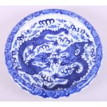 A Chinese blue and white porcelain shallow dish, decorated two dragons and clouds, seal mark to