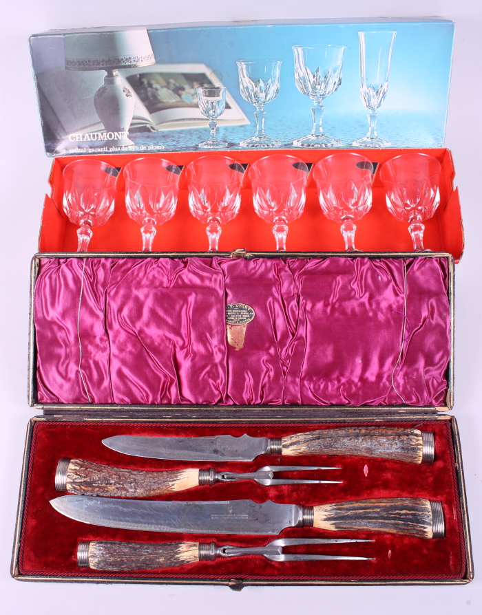 A stag's horn carving set, in box, and six Chaumont wine glasses