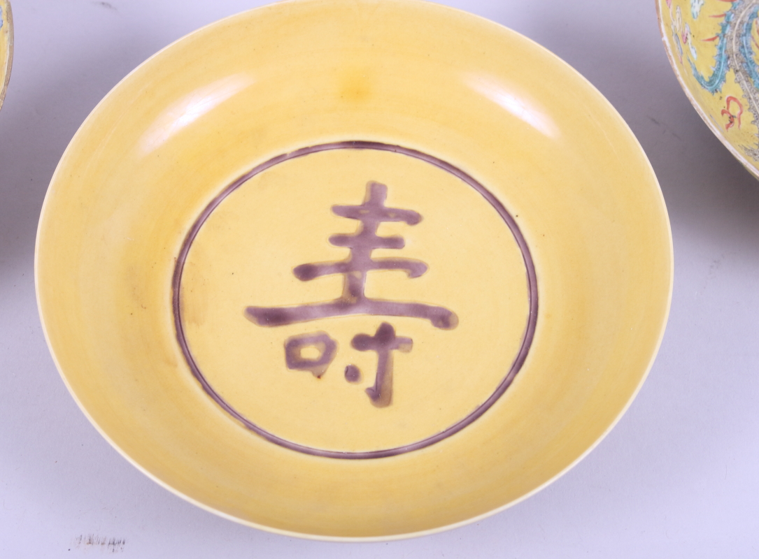 A pair of Chinese porcelain dishes, decorated dragons on a yellow ground, six character marks to - Image 3 of 18