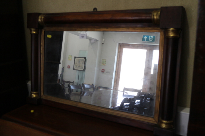 A mid 19th century mahogany overmantel mirror with half columns, plate 13" x 23"