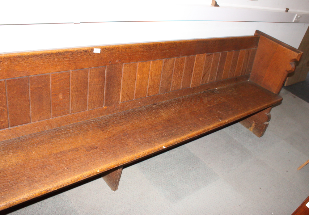 A carved oak pew with trefoil panel ends, 120" long - Image 3 of 3