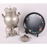 An early 20th century Universal coffee percolator, on stand with two burners, and a floral painted
