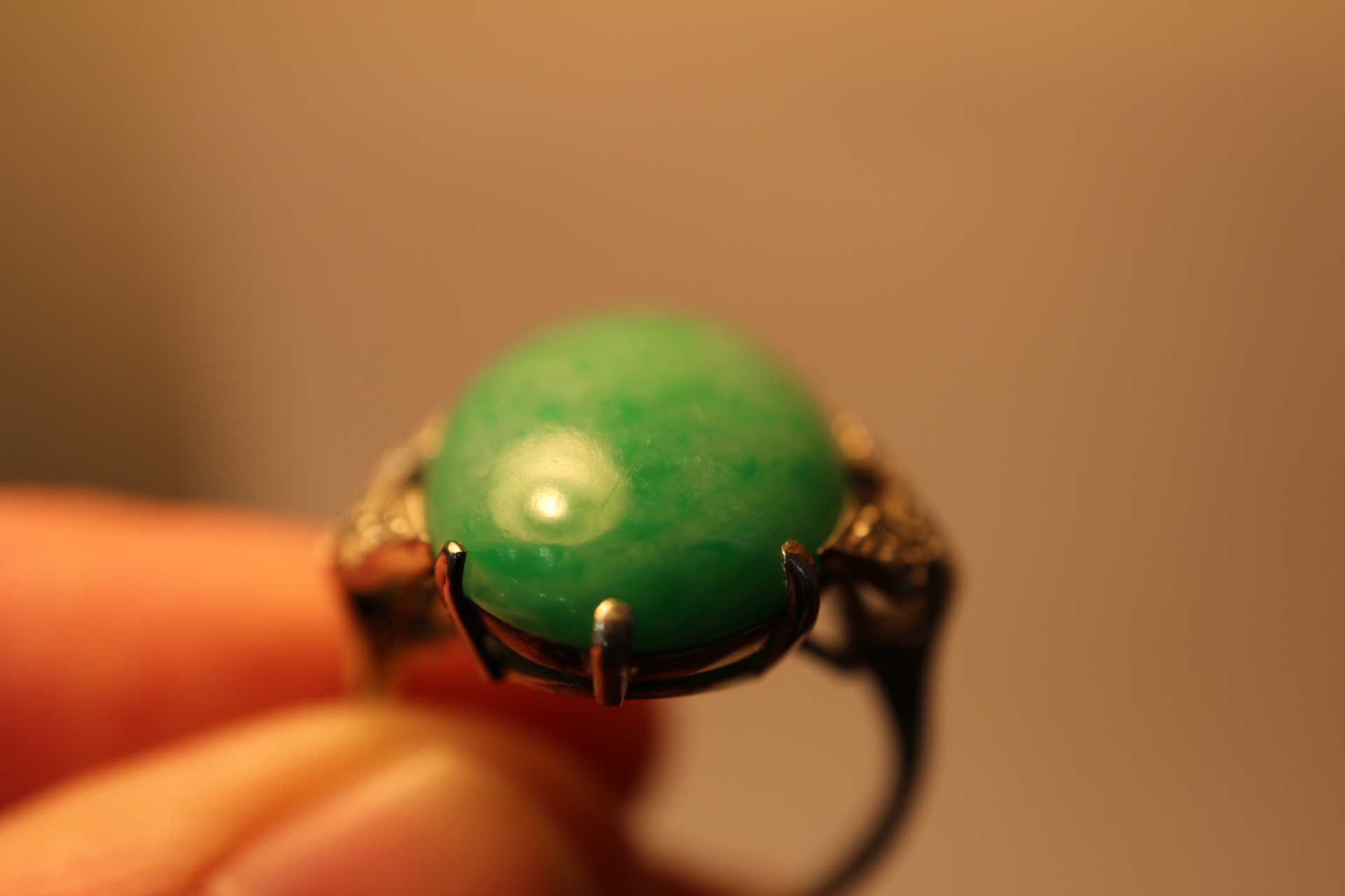 An Art Deco white metal ring, set jade cabochon, flanked three diamonds to each shoulder, ring - Image 10 of 10