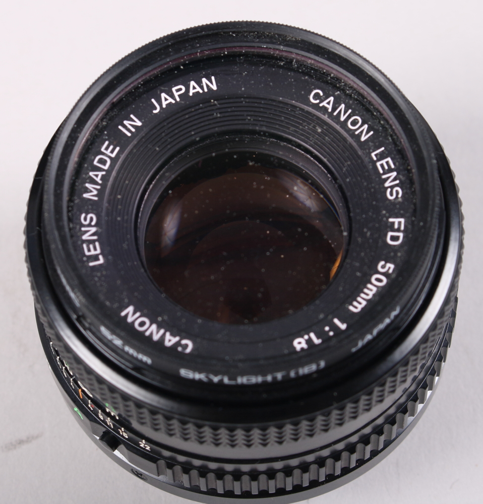 A Canon AE-1 "Program" camera with a FD 135mm lens, a Canon FD 50mm lens, a Canon Ranger Auto 2X, FD - Image 4 of 7