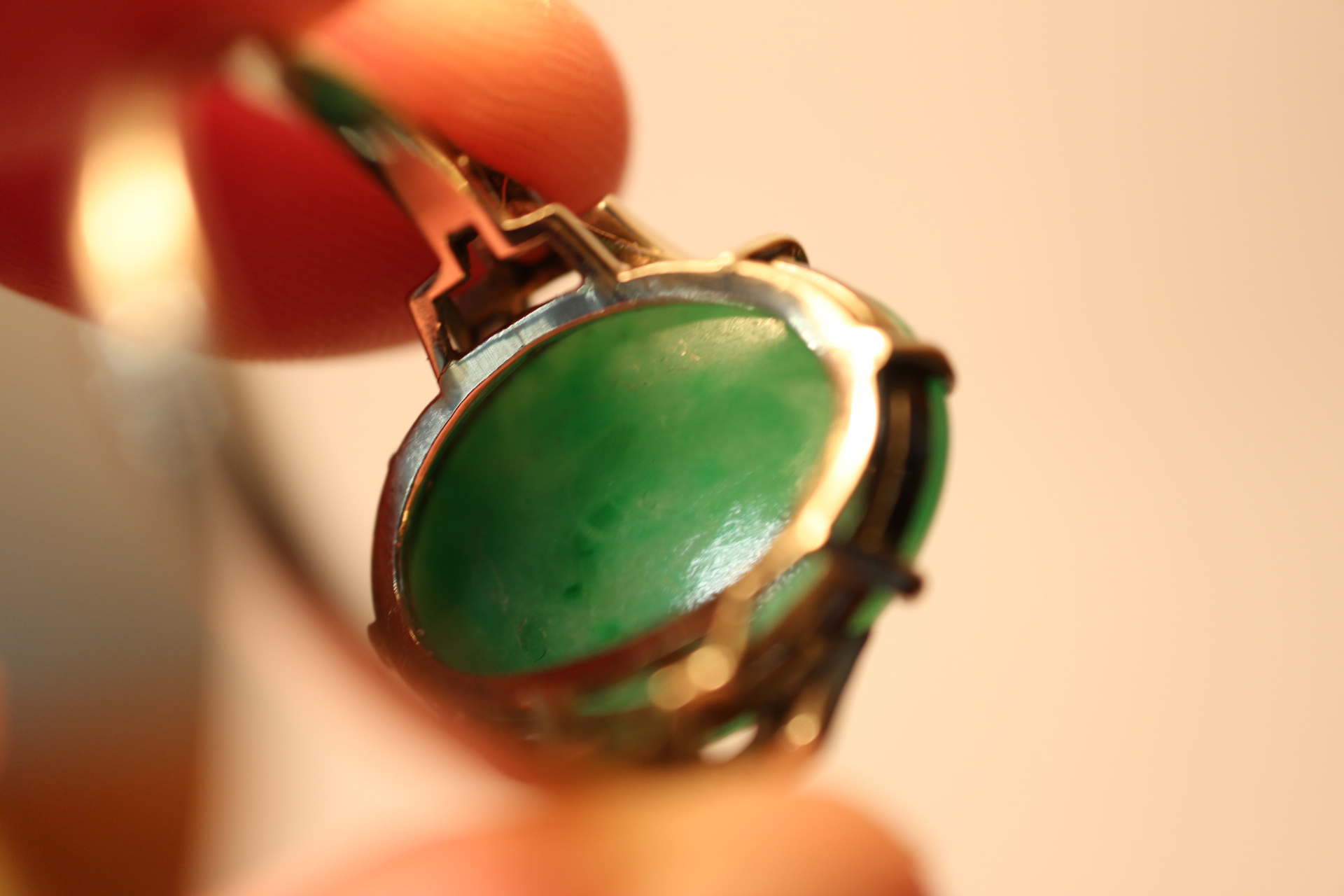 An Art Deco white metal ring, set jade cabochon, flanked three diamonds to each shoulder, ring - Image 9 of 10