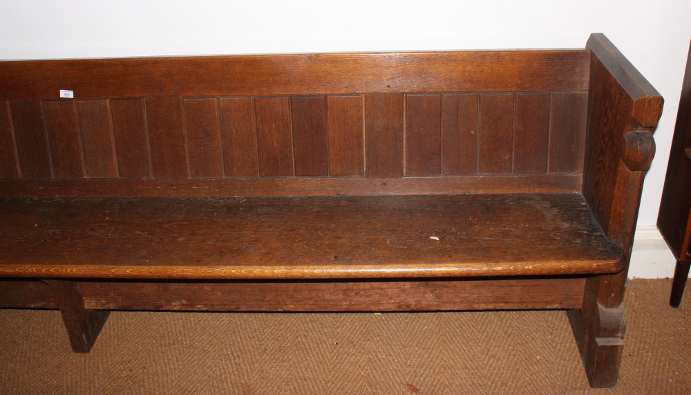 A carved oak pew with trefoil panel ends, 120" long - Image 2 of 3