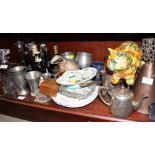 A famille rose raised dish, three decanters, a brass pestle and mortar, a copper saucepan, pewter,