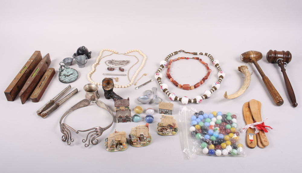 Three spirit levels, a quantity of costume jewellery, marbles, gavels and other miscellaneous items