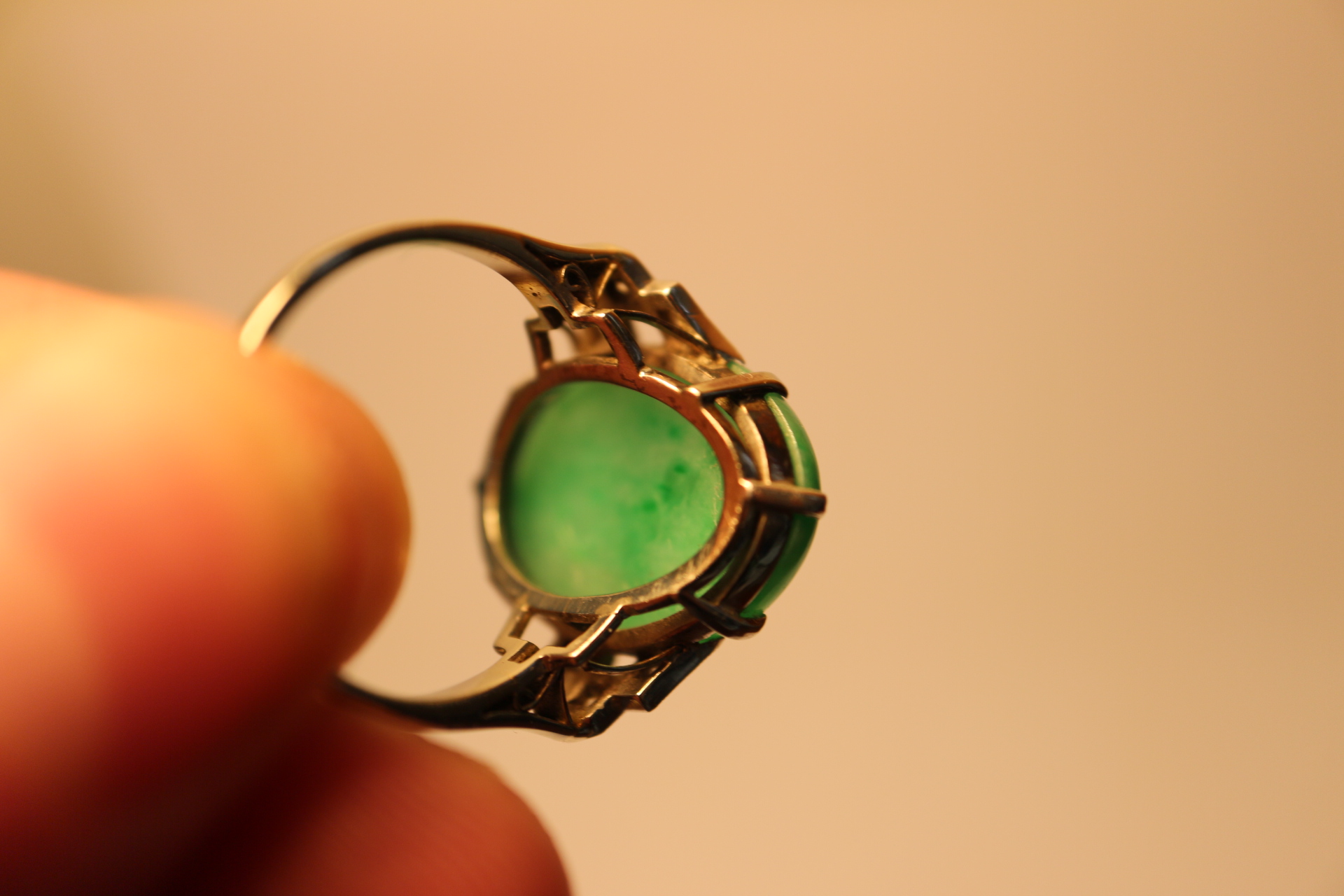 An Art Deco white metal ring, set jade cabochon, flanked three diamonds to each shoulder, ring - Image 8 of 10