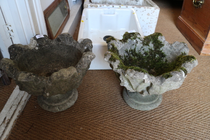 A pair of cast stone "tulip-shape" garden planters, 15" dia x 11" high