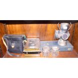 Two pairs of binoculars, a cash tin, a silver plated dessert service, two silver topped glass