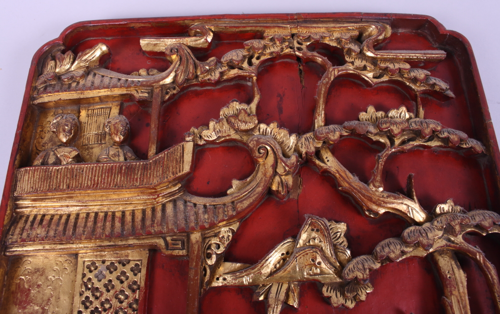 A Chinese red lacquered and gilt carved wood bed panel, decorated figures and buildings, 17" x 13" - Image 2 of 2