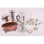 An Egyptian white metal pin tray, a silver plated embossed vase with floral decoration, a plated