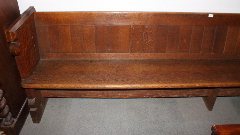 A carved oak pew with trefoil panel ends, 120" long - Image 2 of 3